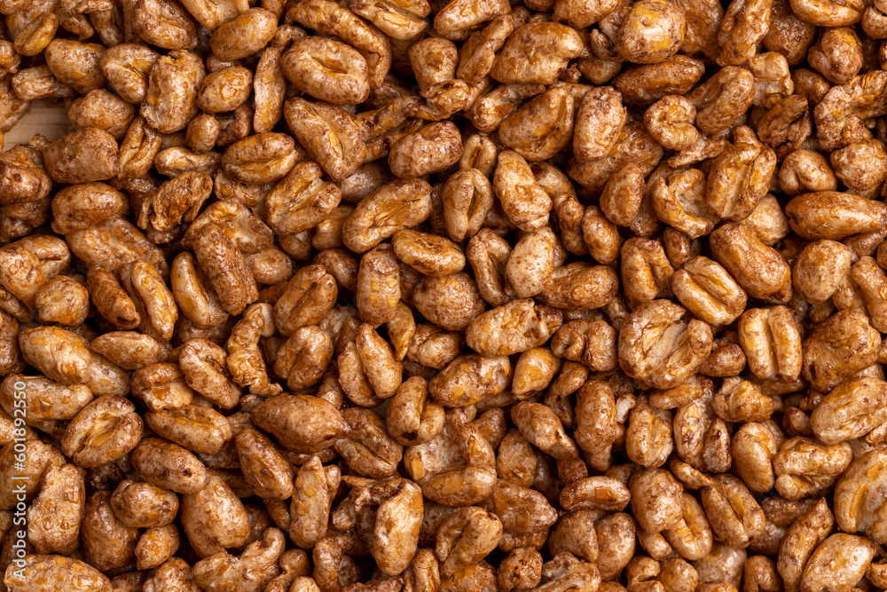 Airy wheat covered with a thin layer of cocoa chocolate Airy wheat covered with a thin layer of cocoa chocolate
