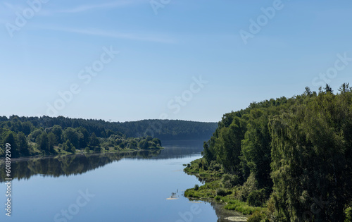 Wide river in summer in sunny weather