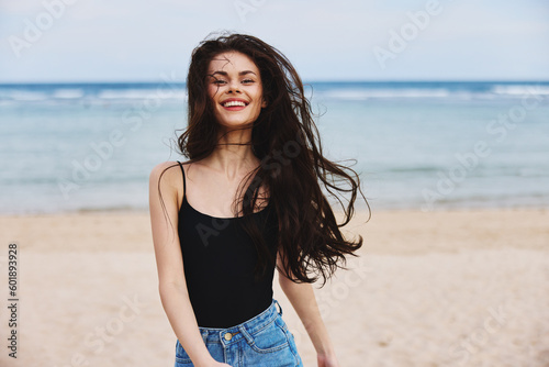 Photography vacation woman sunset young beach sea smile travel summer lifestyle running