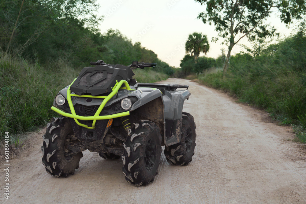Fototapeta premium Modern fast quad bike on pathway outdoors