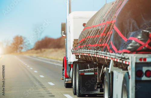 Heavy Duty Cargo Transportation on Top of American Semi Truck Flatbed Trailer