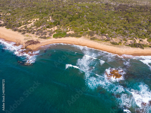 aerial drone photography of beautiful wreck rock beach in deepwater national park near agnes water, queensland, australia; unique beach with turquoise water, rocks and coral reefs