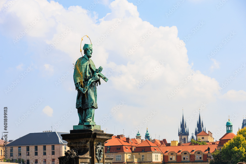 Fototapeta premium Ancient medieval sculptures on the Charles Bridge. Background with selective focus