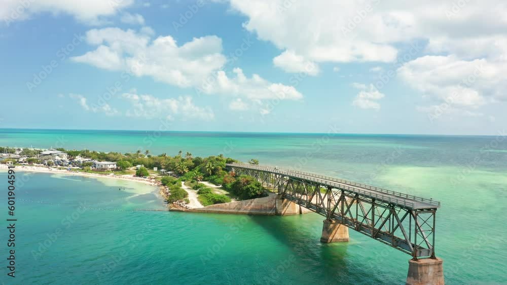 Aerial view of Bahia Honda Rail Bridge and state park. The Bahia Honda Rail Bridge is a derelict railroad bridge in the lower Florida Keys connecting Bahia Honda Key with Spanish Harbor Key Aerial view of Bahia Honda Rail Bridge and state park. The Bahia Honda Rail Bridge is a derelict railroad bridge in the lower Florida Keys connecting Bahia Honda Key with Spanish Harbor Key