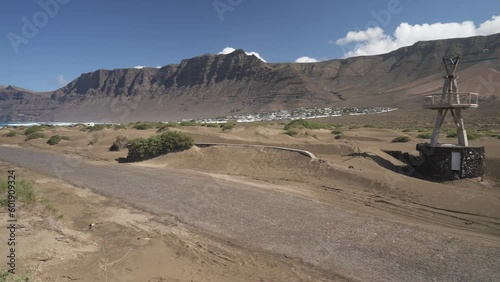 Dramatic coastline and beach at Caleta de Famara, Caleta de Famara, Las Palmas, Lanzarote photo