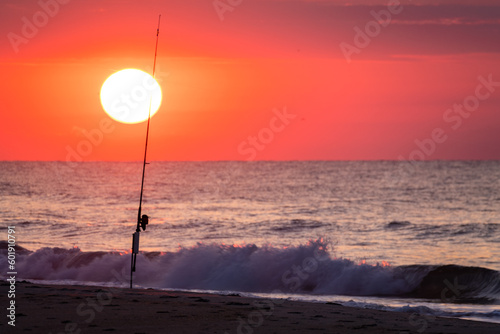 Ocean Sunrise over Fishing Rod © Tom Ramsey