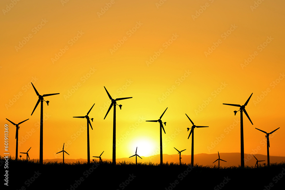 Wind turbines produce electricity in the evening. Sunset, silhouette, windmills, clean energy in the evening. renewable energy concept alternative energy clean energy wind energy