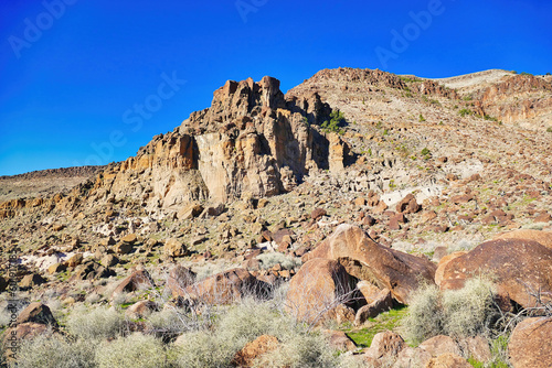 Desert landscape with bare rocks along the Barber Peak Trail in the Providence Mountains, Mojave National Preserve, California, USA 