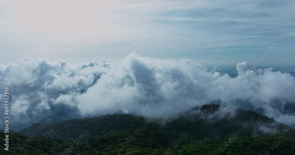 Beautiful Fog over Mountains in Thailand,Amazing fog sea.Aerial view landscape of mountain peak with misty cloud in the morning.Footage b roll 4k.Drone nature shot Beautiful Fog over Mountains in Thailand,Amazing fog sea.Aerial view landscape of mountain peak with misty cloud in the morning.Footage b roll 4k.Drone nature shot