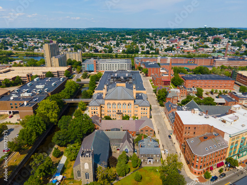 Lowell Public High School and St Anne's Episcopal Church aerial view on Kirt Street at Merrimack in historic downtown Lowell, Massachusetts MA, USA.  photo