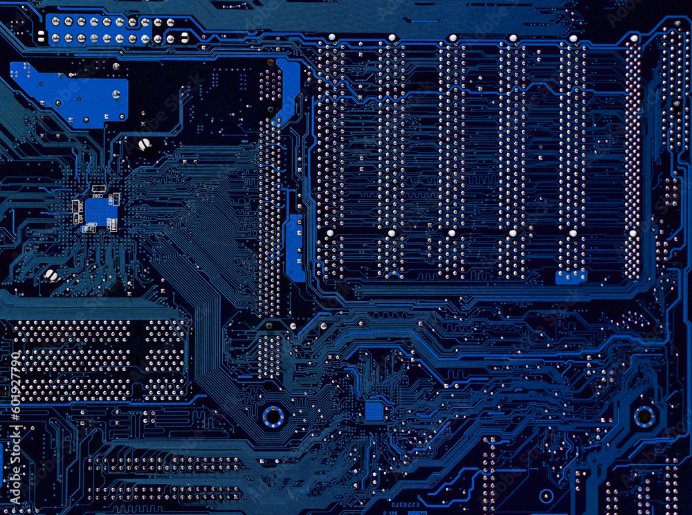 Closeup of Dark Blue Connections Electronic Circuit Board is an ...