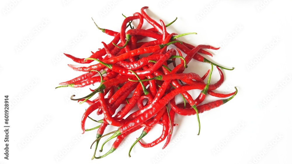 Fototapeta premium Cabai merah keriting or red hot chili peppers spicy blurred defocus isolated on white background