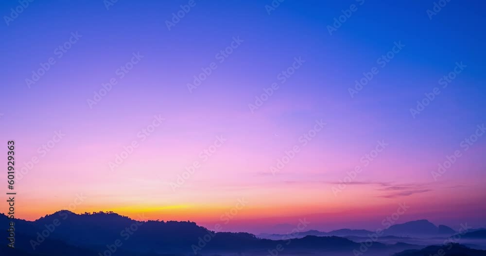 Beautiful 4K Time lapse of Majestic sunrise or sunset clouds sky landscape,Amazing light of nature cloudscape sky over mountains Beautiful 4K Time lapse of Majestic sunrise or sunset clouds sky landscape,Amazing light of nature cloudscape sky over mountains