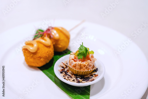 Salmon Filled Bread Place on the grain of rice used to decorate the dish for an appetizing look. Served with fried meatballs placed on a white plate