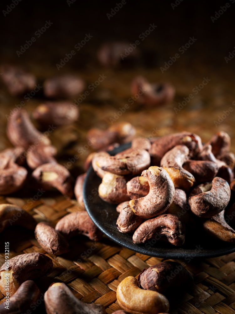roasted cashew nuts on a plate roasted cashew nuts on a plate