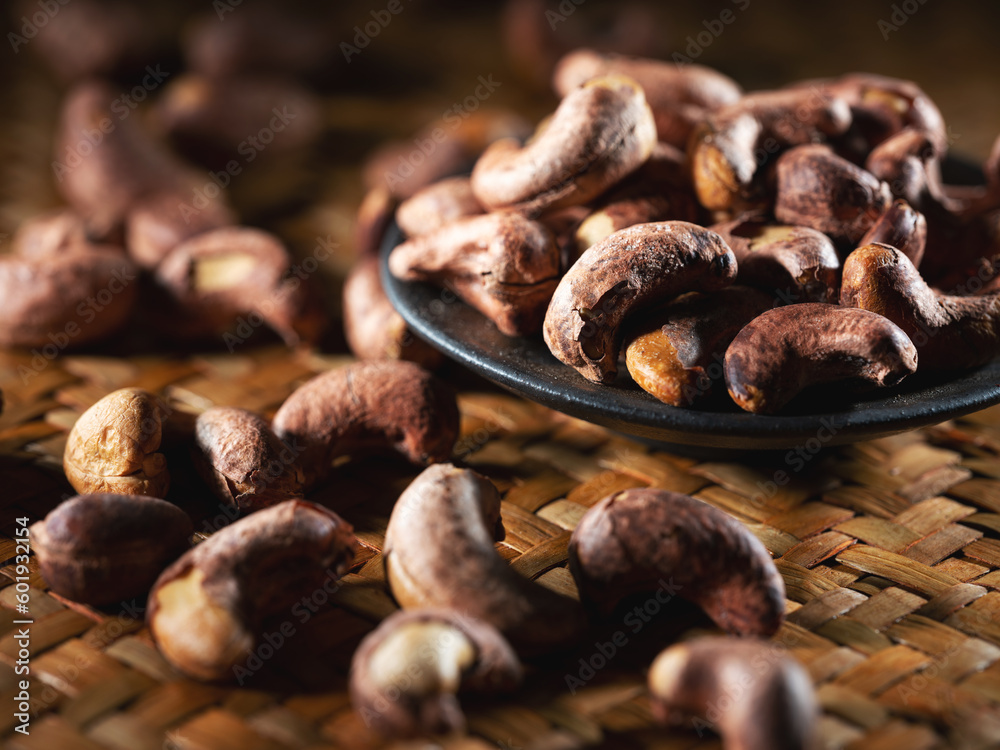 roasted cashew nuts on a plate roasted cashew nuts on a plate