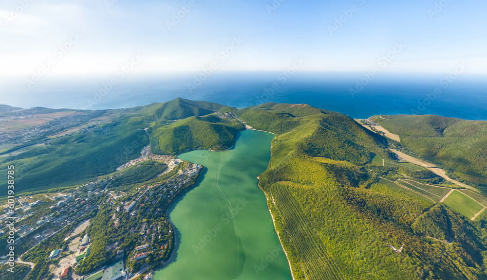Abrau-Durso, Russia. View of Lake Obrao, mountains, Black Sea and vineyards. Summer. Aerial view