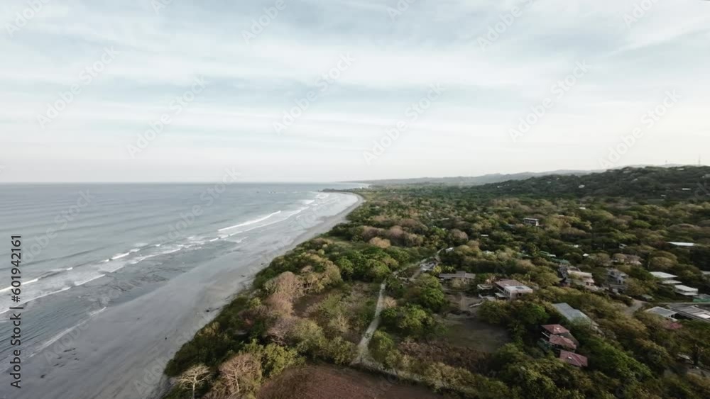 Small Costa Rica town on ocean coastline, aerial drone view Small Costa Rica town on ocean coastline, aerial drone view