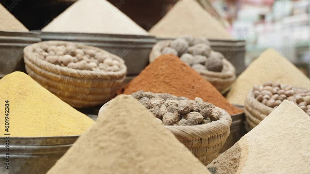 Piles of fresh seasoning in market of Morocco, handheld view Piles of fresh seasoning in market of Morocco, handheld view