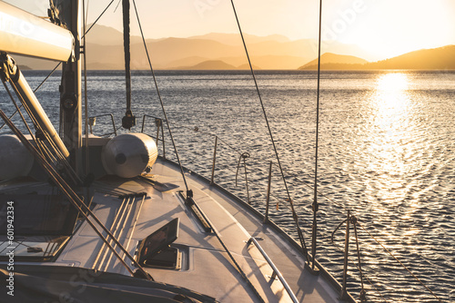 Yacht sailing at dawn