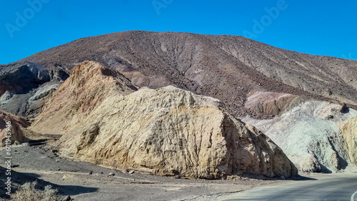 Scenic view of colorful geology of multi hued Amargosa Chaos rock formations in Death Valley National Park, Furnace Creek, California, USA. Barren desert landscape of Artist Palette in Black mountains