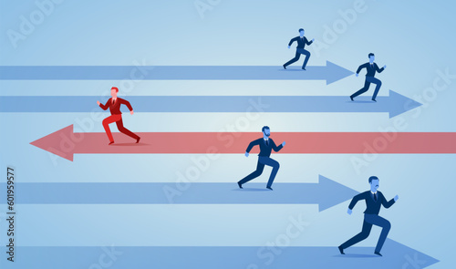 Vector of a group of businessmen running in one direction and one business man in opposite