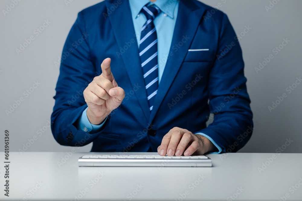 Person typing on a computer keyboard, businessman is working in a startup company's office, he is typing messages to his colleagues and making financial documents summarizing the meetings. Copy space. Person typing on a computer keyboard, businessman is working in a startup company's office, he is typing messages to his colleagues and making financial documents summarizing the meetings. Copy space.