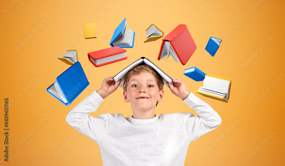 Kid with book on head on yellow background, learning and reading - obrazy, fototapety, plakaty 