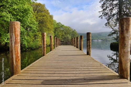 Tableau sur toile wooden jetty boardwalk  in the late dictrict windermere