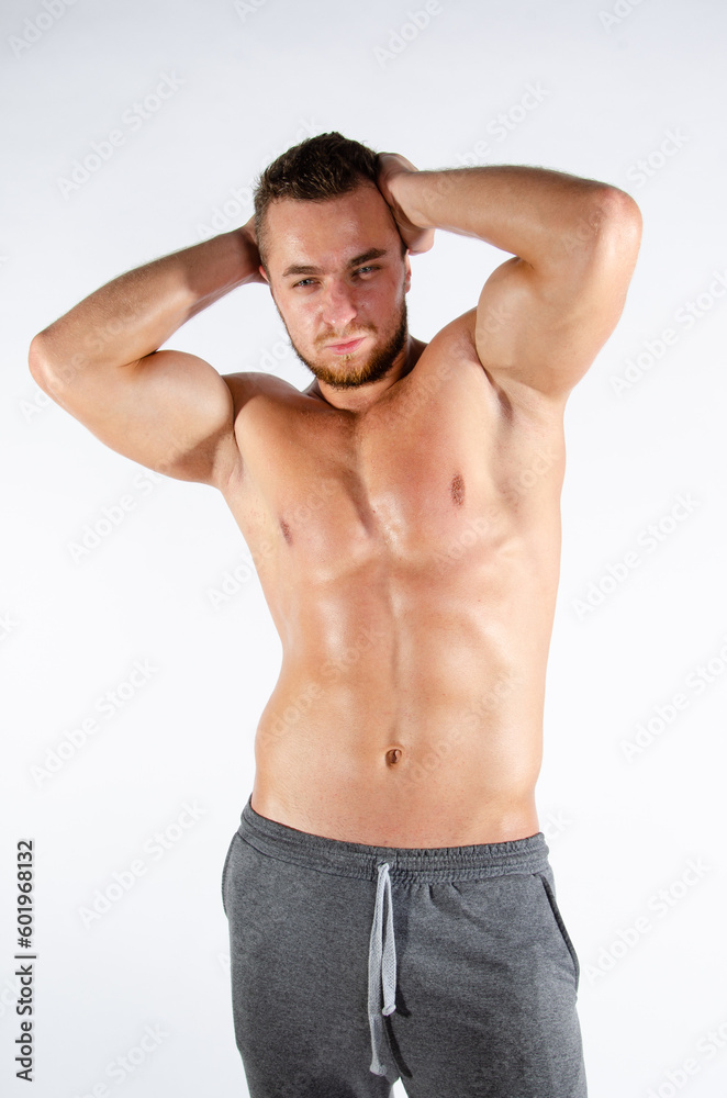 Young handsome guy on a diet. A man with a beautiful athletic body. Young handsome guy on a diet. A man with a beautiful athletic body.