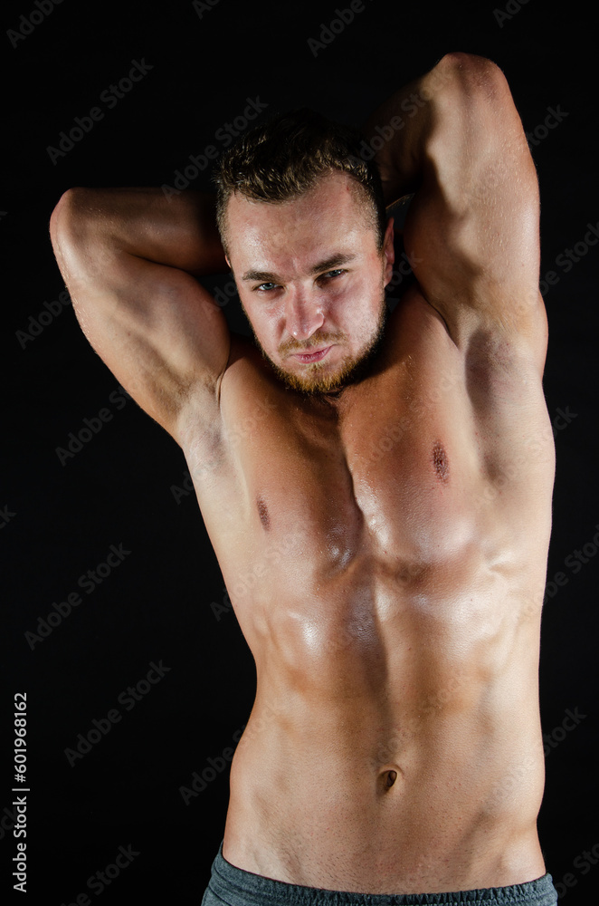 Young handsome guy on a diet. A man with a beautiful athletic body. Young handsome guy on a diet. A man with a beautiful athletic body.