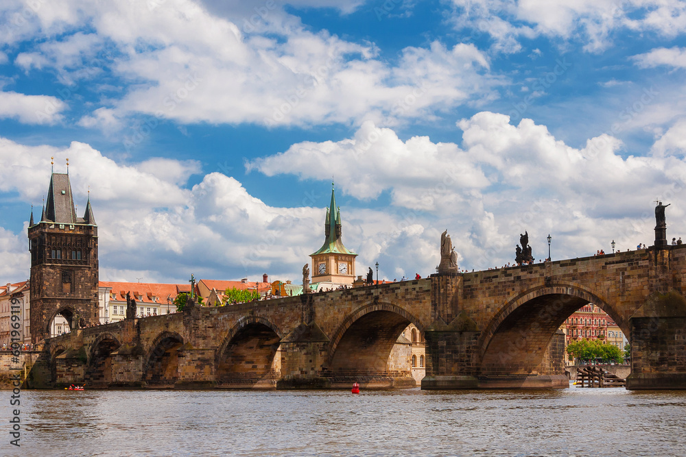 Fototapeta premium Medieval Charles Bridge on River Vltava with Old Town Bridge Tower and Water Tower in Prague