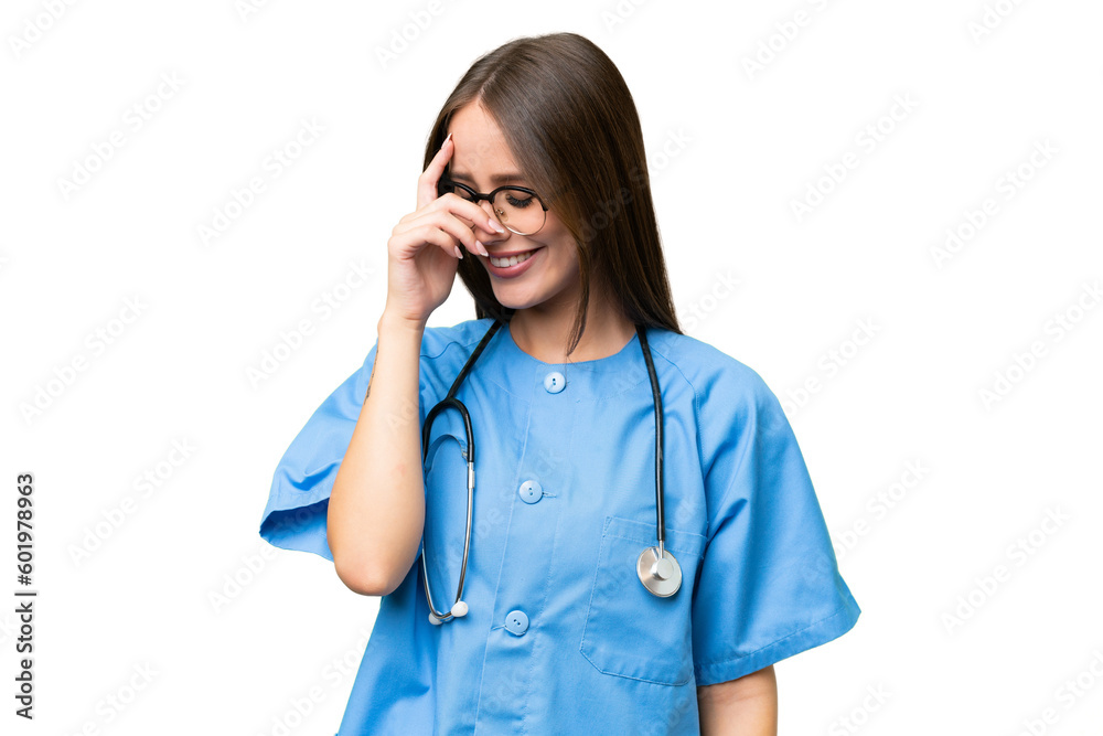 Young nurse caucasian woman over isolated background laughing Young nurse caucasian woman over isolated background laughing