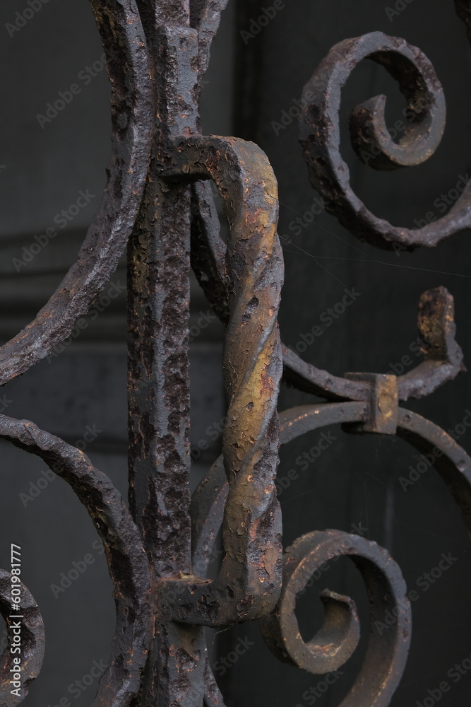Rust deteriorations. Really old and decrepit door from a century-old cemetery (Père Lachaise, France) Rust deteriorations. Really old and decrepit door from a century-old cemetery (Père Lachaise, France)