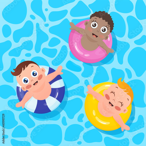 Children swimming in pool with lifebuoy in blue pool water