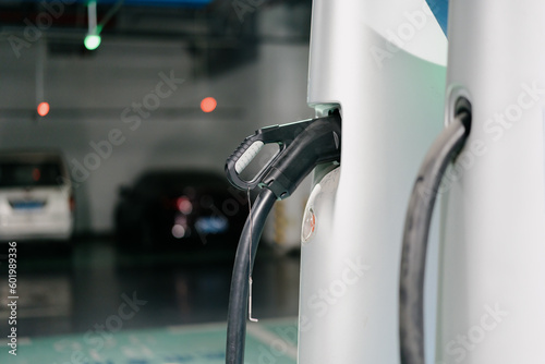 electric car charging in station 