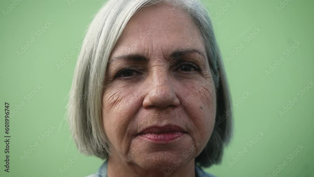 Senior woman looking into the camera - Elderly people lifestyle concept - Close up headshot Senior woman looking into the camera - Elderly people lifestyle concept - Close up headshot