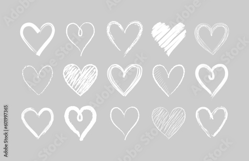 Set of doodle hand drawn hearts. Cute sketched heart shaped design elements