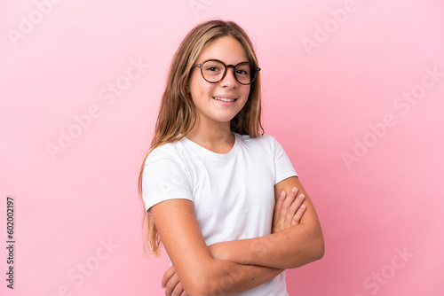 Little caucasian girl isolated on pink background With glasses with happy expression