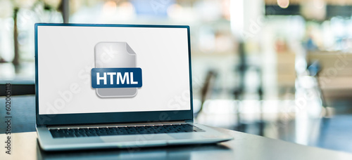 Laptop computer displaying the icon of HTML file