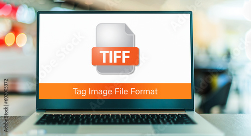 Laptop computer displaying the icon of TIFF file photo