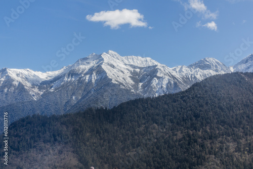 Snow covered peaks near Siguniangshan town in Sichuan province, China
