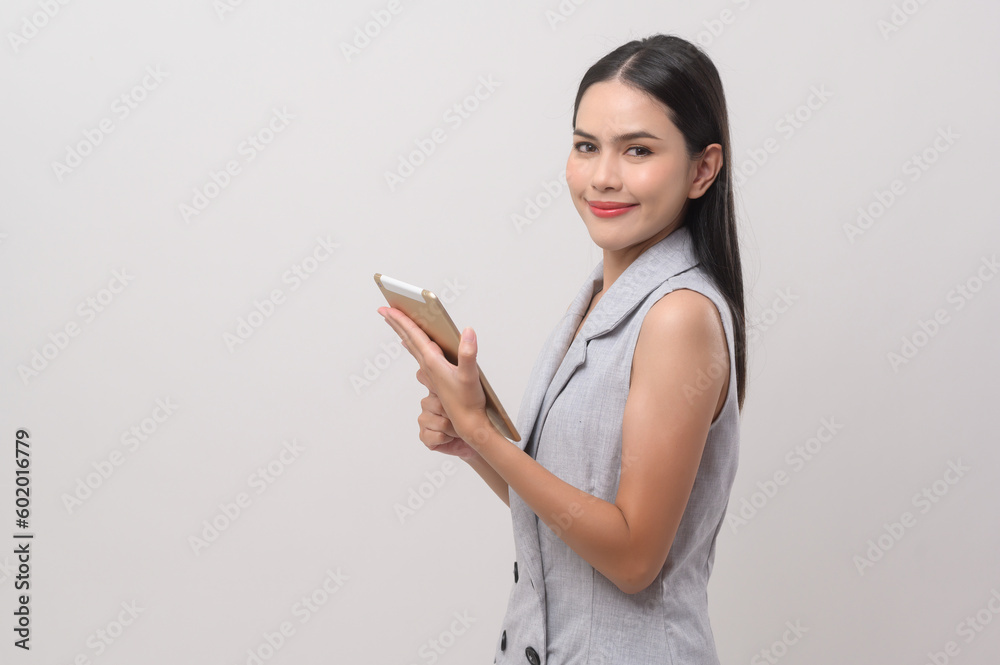 Beautiful woman using tablet over white background, technology concept. . Beautiful woman using tablet over white background, technology concept. .