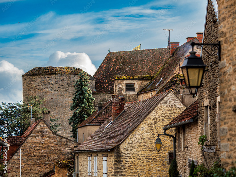 Medieval city of Chateauneuf in Burgundy. A cozy, cute town that grew up around a huge old castle. Medieval city of Chateauneuf in Burgundy. A cozy, cute town that grew up around a huge old castle.