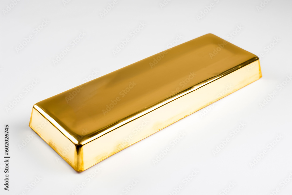 An unadorned gold bar sits on a plain white backdrop in studio lighting, free from any text or markings. generative AI. An unadorned gold bar sits on a plain white backdrop in studio lighting, free from any text or markings. generative AI.