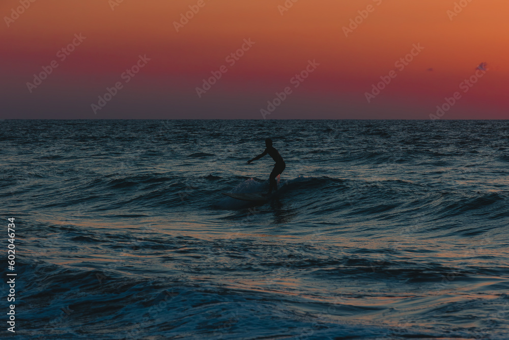 silhouette of a surfer. The photo was taken in La Union Philippines.