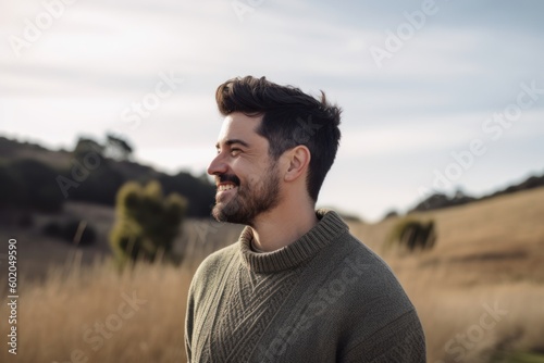 Medium shot portrait photography of a satisfied man in his 30s wearing a cozy sweater against a countryside or rural background. Generative AI