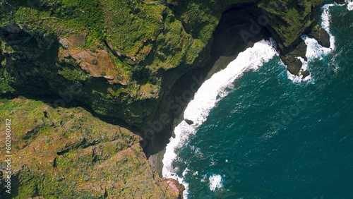 Rocky ocean coastline landscape. Aerial top down view of Anaga green mountains near village Chinamada. Hiking on Tenerife, Canary Islands. photo