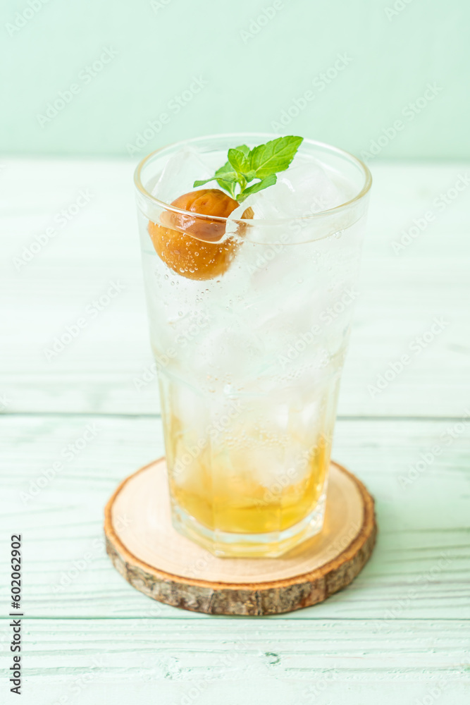 iced plum juice with soda and peppermint iced plum juice with soda and peppermint