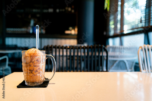 Thai tea ice scoop in glass